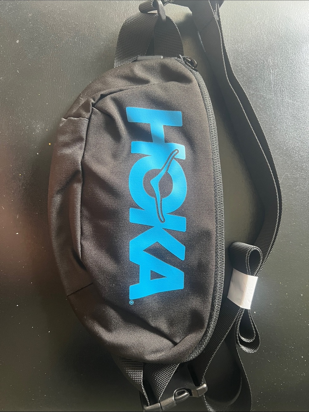 Hoka Black Sling Bag with Bright Blue Logo